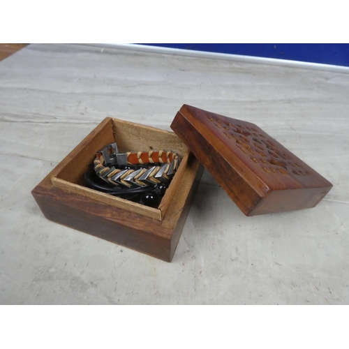 443 - A wooden trinket box and contents.