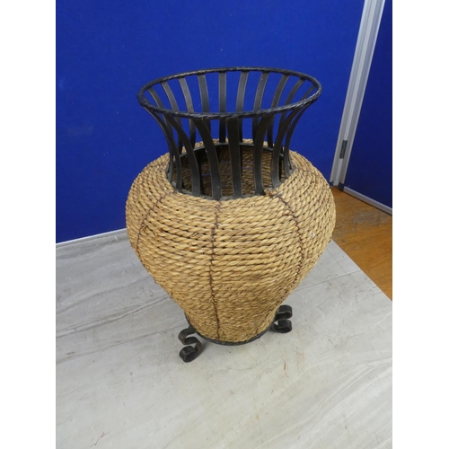 456 - A metal and wicker covered vase. Approx 40cm.