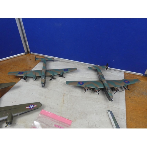 464 - Four military toy planes.