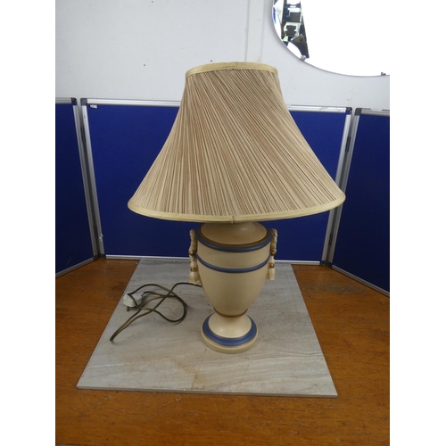 469 - A large ceramic table lamp and shade. Approx 65cm.