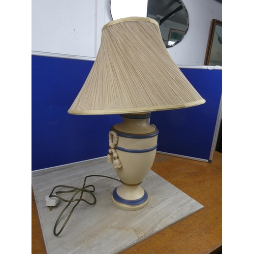 469 - A large ceramic table lamp and shade. Approx 65cm.