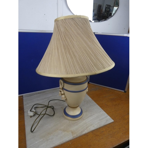 469 - A large ceramic table lamp and shade. Approx 65cm.