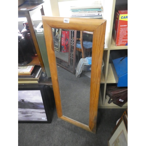 487 - A pine framed wall mirror. Approx 43x105cm.