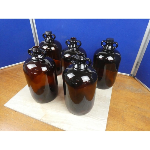 491 - Five brown glass demijohn bottles