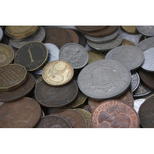 517 - A lot of various antique coinage and a miniature pewter seal figure.