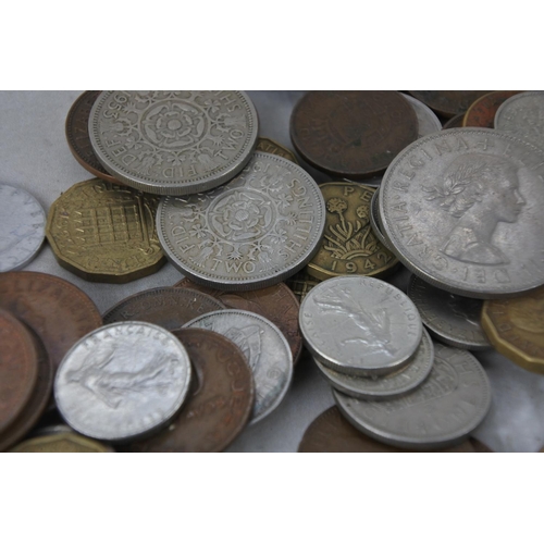 517 - A lot of various antique coinage and a miniature pewter seal figure.