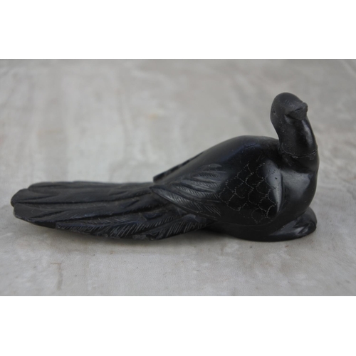 523 - A vintage ebony figure of a bird (a/f).