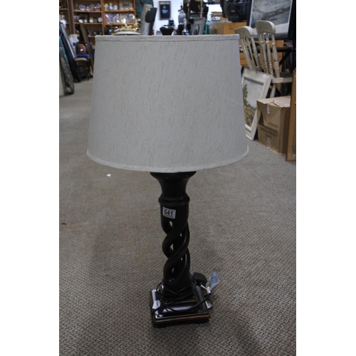 541 - A large twisted column table lamp base and shade. Approx 75cm.