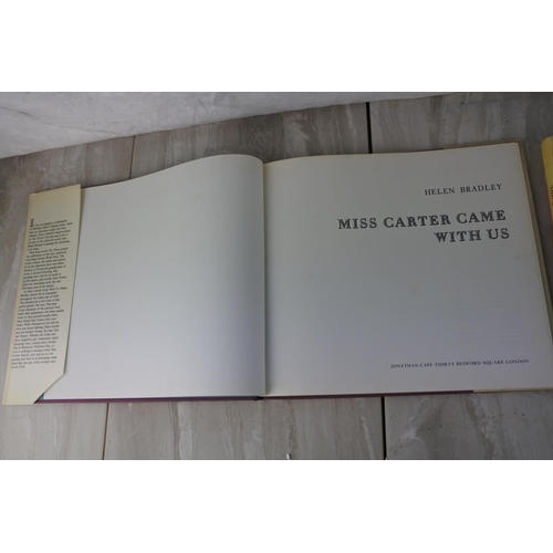 546 - Two vintage books by Helen Bradley 'The Queen who came to Tea' and 'Miss Carter Came with Us'.