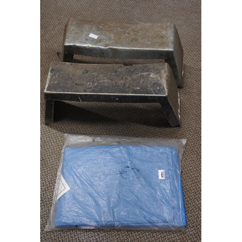 547 - Two metal brackets and a Marksman tarpaulin cover.