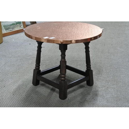 552 - A stunning vintage occasional table with copper beaten top. Approx 60x49x60cm.