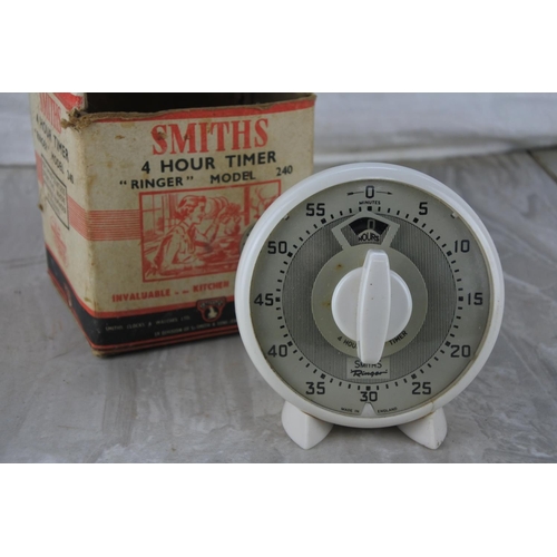 562 - A vintage boxed Smiths 4 hour timer 'Ringer' Model 240.