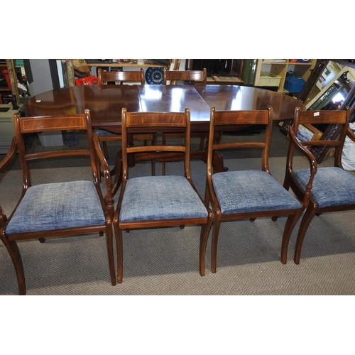 568 - A mahogany dining room table and six chairs set. Approx 90x195x75cm.