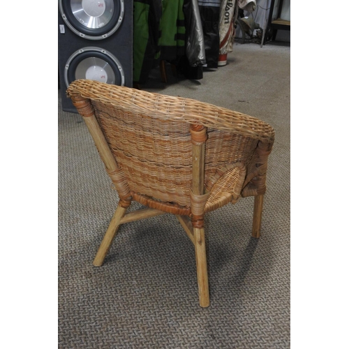 570 - A small rattan chair.