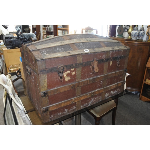 587 - An antique dome lidded trunk. Approx 91x55x47cm.