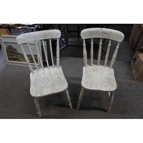 589 - A pair of painted kitchen chairs with rail backs.