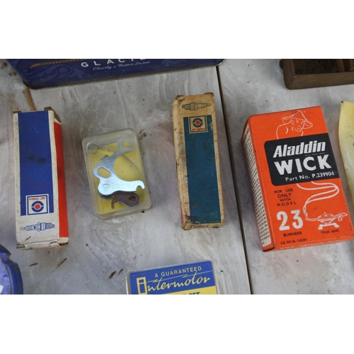 704 - A vintage Fyffes shop hook, a roll of vintage Maxoll stickers. a vintage boxed Aladdin Wick and lots... 