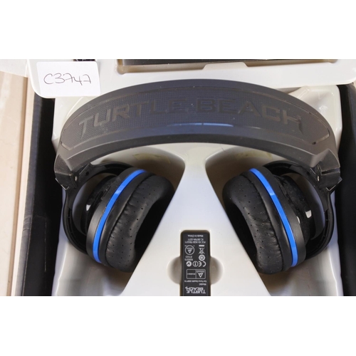 707 - A boxed Turtle Beach gaming headphones.