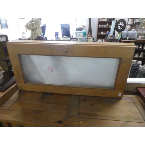 711 - A wooden cased shop counter display case.  Approx 106x52x13cm.