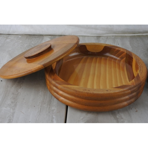 733 - A vintage New Zealand wooden lidded dish, another, an ashtray and a boxed condiment set.