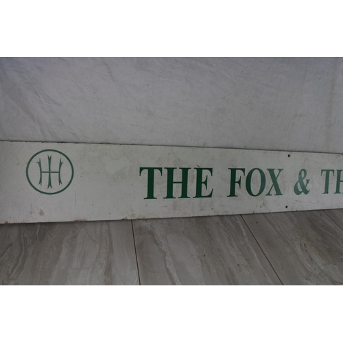 747 - A large sign 'The Fox and The Hound'.  Approx 152x18cm.