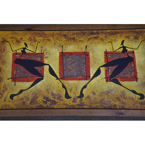 748 - A framed picture of a tribal scene and a oriental print on canvas. Largest approx 56x105cm.