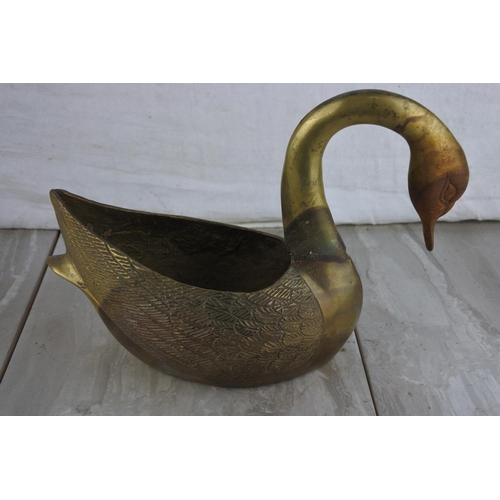 759 - A large brass swan planter