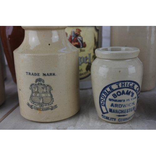 764 - A collection of vintage stoneware jars and more.