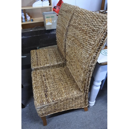 767 - A pair of rattan chairs.