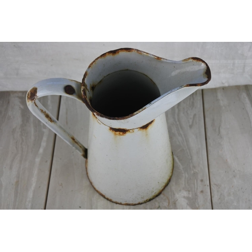 781 - A vintage enamel water jug.  Approx 28cm.