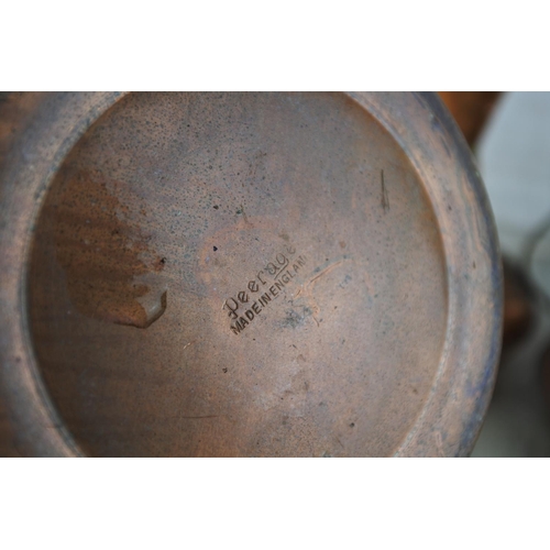 783 - Four vintage copper jugs.