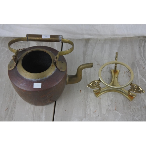 792 - A brass and copper spirit kettle on stand (missing lid).