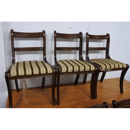 799 - A mahogany dining room table and six chair set.  Approx 100x160x75cm.