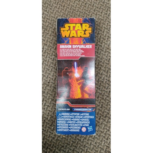 314 - A Hasbro Star Wars Anakin Skywalker action figure in original packaging.