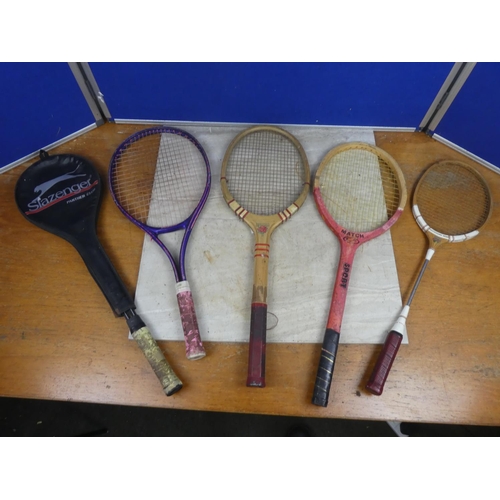 827 - A vintage Improved badminton racket, a vintage Waratah tennis racket and two others.