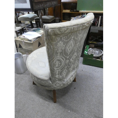 829 - A vintage upholstered bedroom chair.