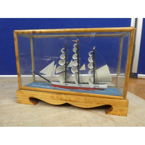 837 - A glass ship in bottle 'Golden Hind' and another.