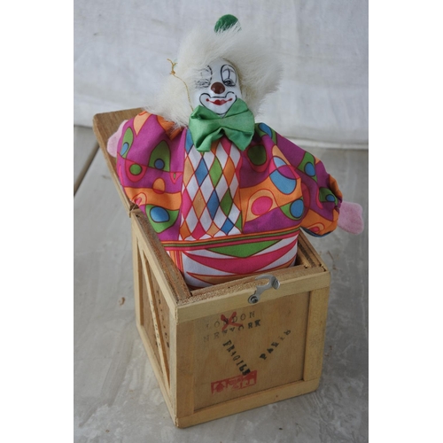 847 - A wooden box with pop up clown.