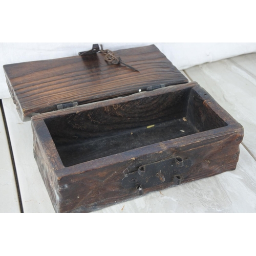 855 - A wood and metal jewellery box.