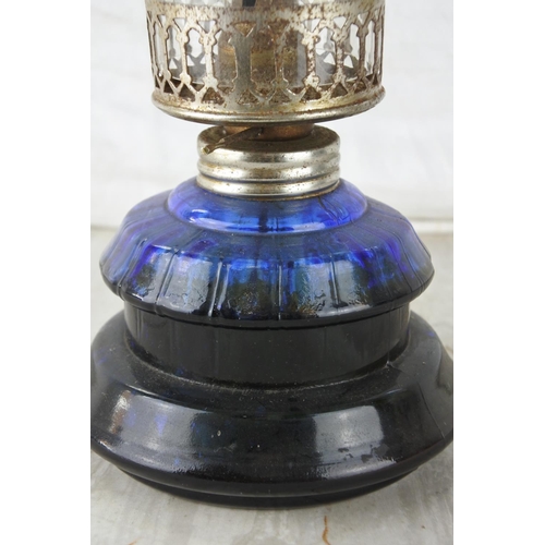 862 - A vintage blue glass oil lamp.  Approx 30cm.