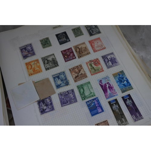 872 - A vintage/ antique stamp album with contents.