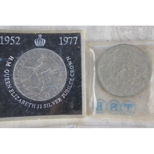 885 - A cased H M Queen Elizabeth Silver Jubilee Crown and three other coins.