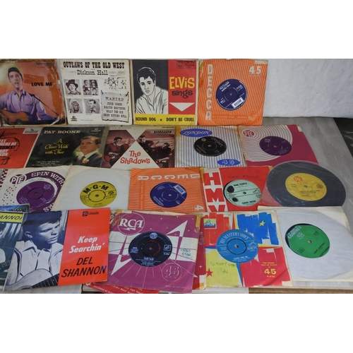 886 - A lot of vintage 45's to include Elvis Presley, Sandy Nelson, The Shadows, Pat Boone, Del Shannon an... 