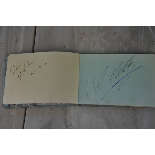 896 - A vintage autograph album with motor sport interest, containing autographs such as Robert Dunlop, St... 