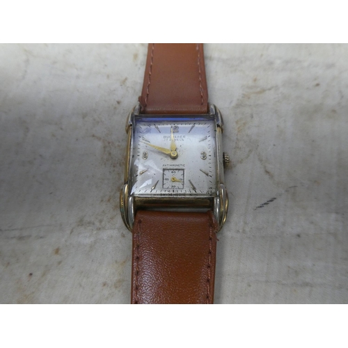 912 - A vintage gents Bucherer mechanical wrist watch - working.