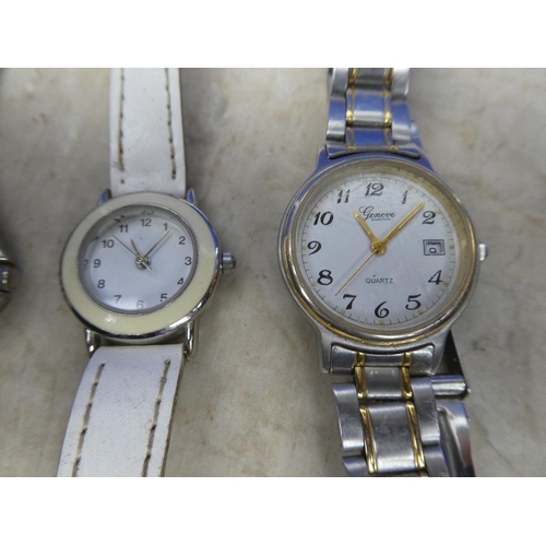 919 - Five working wrist watches to include Geneve, copy Calvin Klein and more.