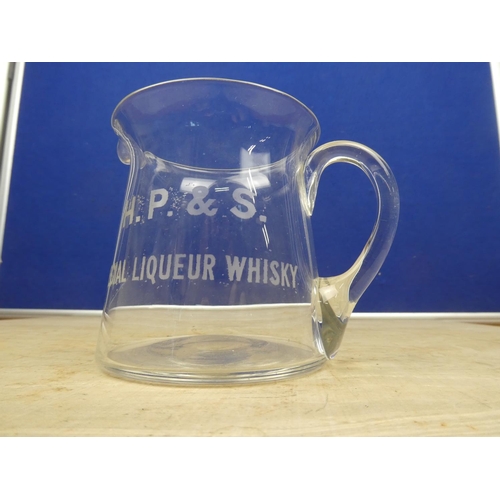 928 - A vintage H P & S Special Liqueur Whisky glass jug.