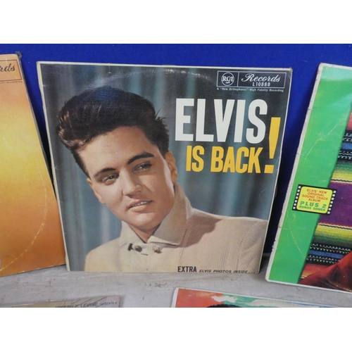 929 - A lot of vintage records/albums to include Elvis, a Golden Age of Donegan, The Graduate and more.