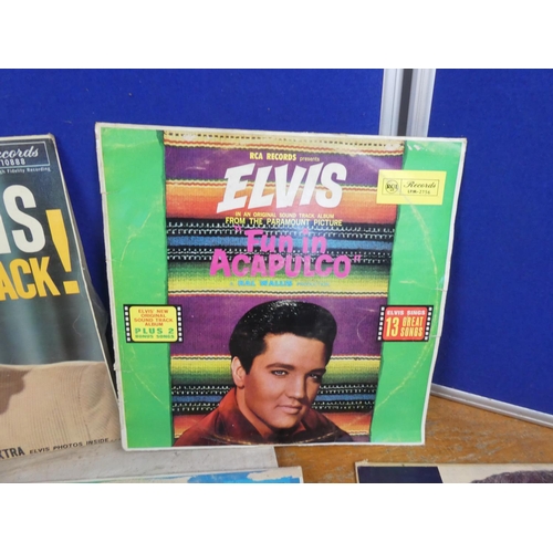 929 - A lot of vintage records/albums to include Elvis, a Golden Age of Donegan, The Graduate and more.