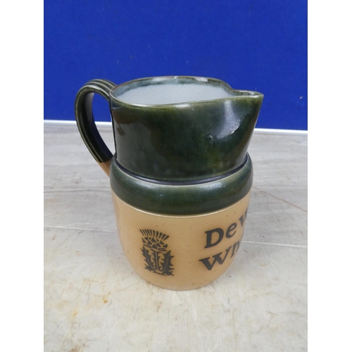 932 - A vintage Royal Doulton Dewar's Whisky jug.